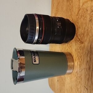 Coffee Cups one Stanley and one protocol camera lense mug